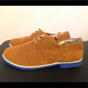 Tan suede laced shoes